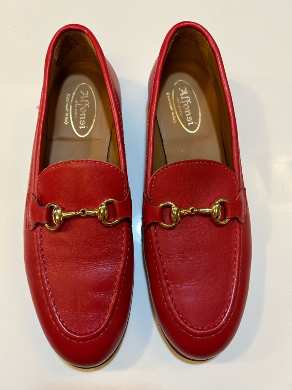 Classic Red Leather Slip-On Loafers with Gold Hardware Italian made.